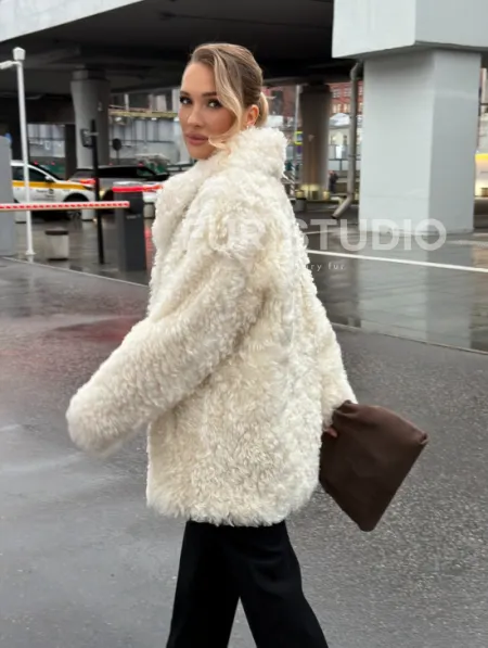 Белая шубка из тиградо - фото 13