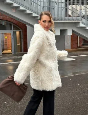 Белая шубка из тиградо - фото 19